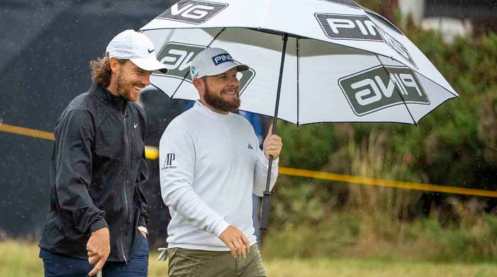 Tommy Fleetwood (left) and Tyrrell Hatton talk on the fourth hole during a practice round at the 2023 British Open.